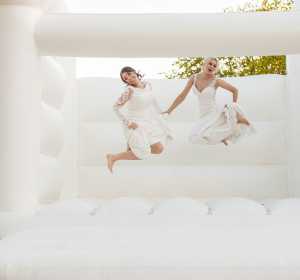 Stunning couple celebrate bouncy castle vaulty manor